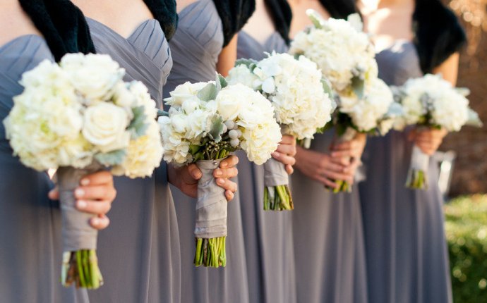 Wear grey dresses black shrugs ivory wedding flowers bouquets